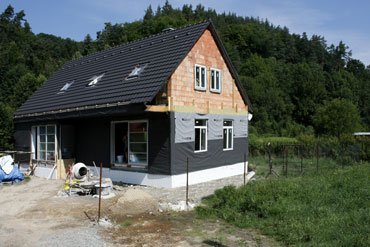 Realizace zateplení minerální vatou a větrané dřevěné fasády ze Sibiřského modřínu